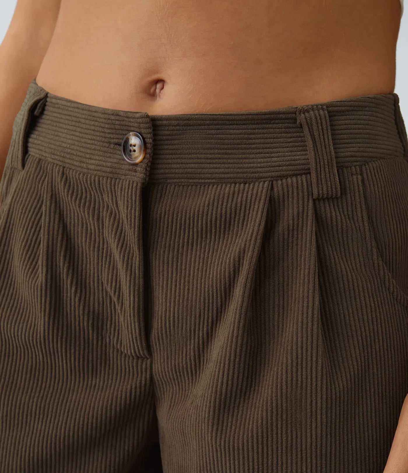 Pantalones de pana casual de tiro medio con bolsillos con cremallera